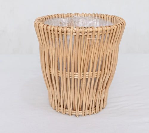 Natural wicker trash can with clear liner, rustic woven design for home or office use