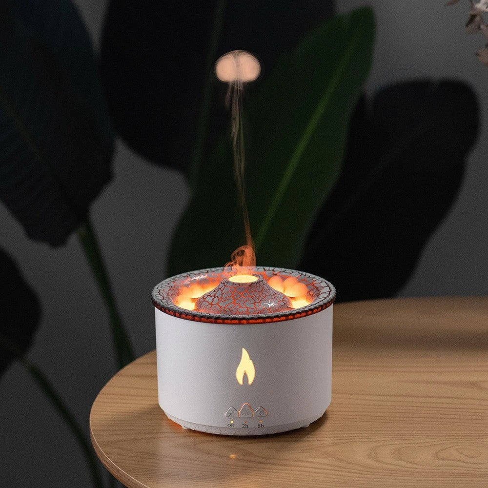 Flame-effect aroma diffuser with glowing lava design, emitting mist on wooden table
