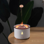 Flame-effect aroma diffuser with glowing lava design, emitting mist on wooden table