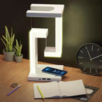 Modern LED desk lamp with wireless charger, USB ports, and sleek white design for cozy home office setup
