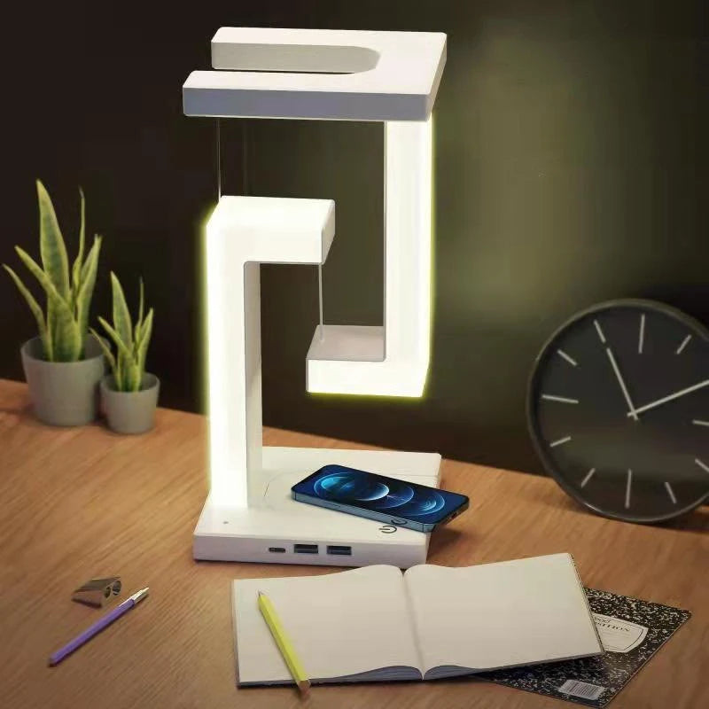 Modern LED desk lamp with wireless charger, USB ports, and sleek white design for cozy home office setup