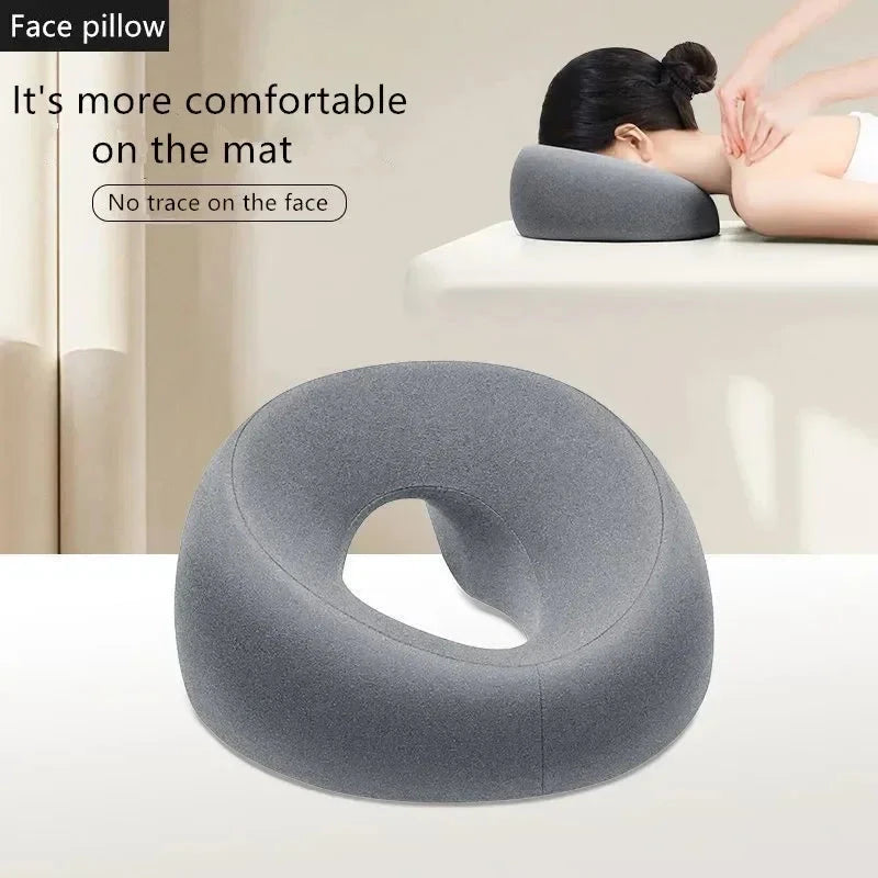 Gray face pillow with hole for comfort during massage, no face marks, ideal for spa or home use