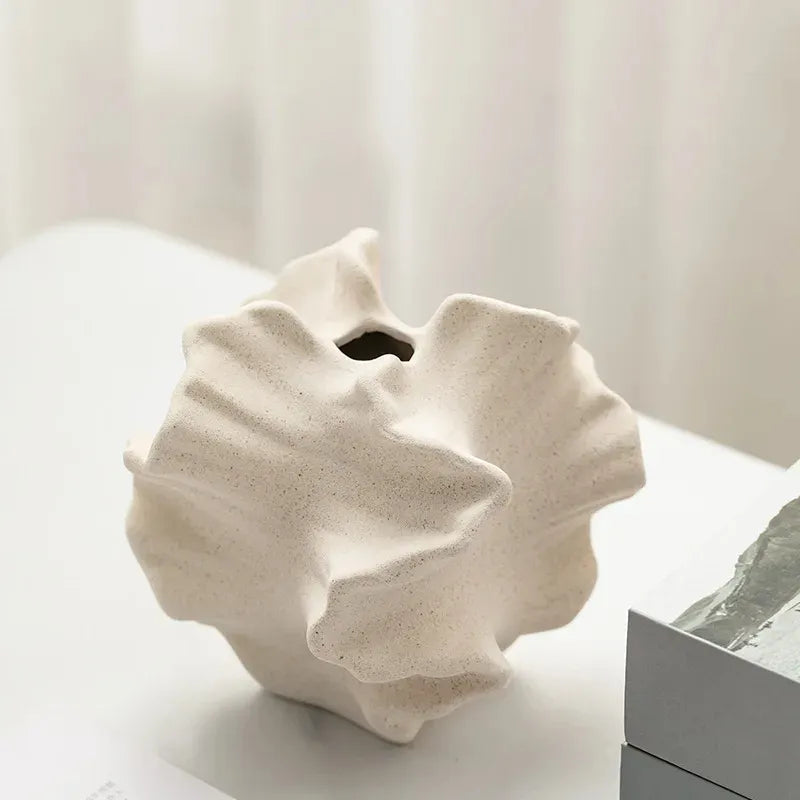 Organic ceramic vase with textured, sculptural design for modern home decor