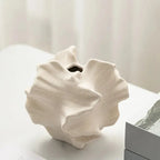 Organic ceramic vase with textured, sculptural design for modern home decor