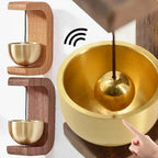 Golden singing bowl with wooden holder, hand striking for meditation sound therapy