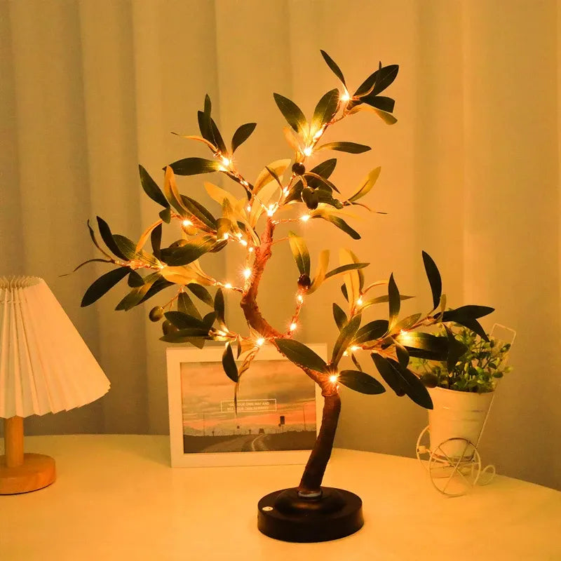Cozy LED olive tree lamp with warm fairy lights, perfect for bedside or desk decor