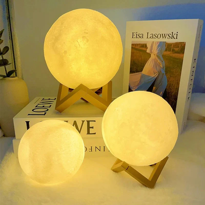 Glowing 3D moon lamps with wooden stands, cozy bedroom nightlight decor
