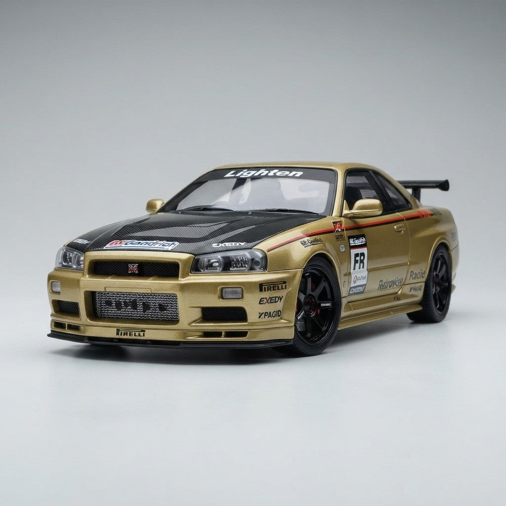 Gold Nissan GT-R diecast model with racing decals, carbon fiber hood, and black rims