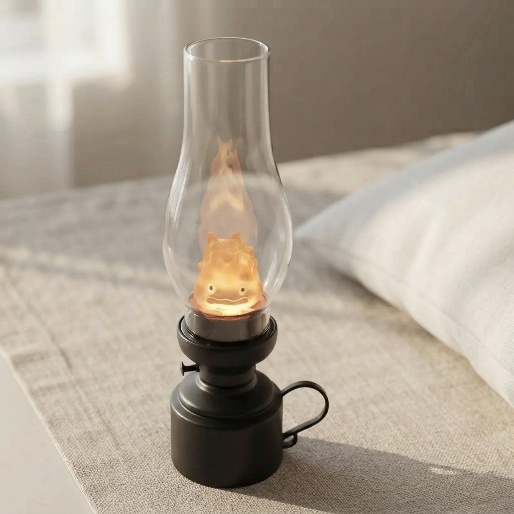 Cute flame-shaped night light in glass lantern, cozy bedroom decor with soft glow